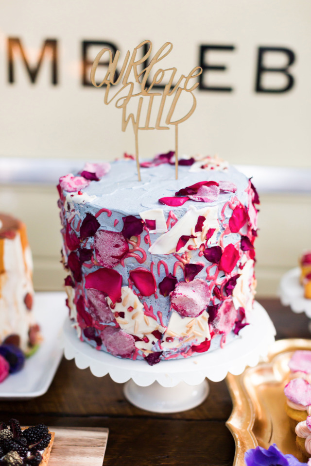 rose petal covered wedding cake