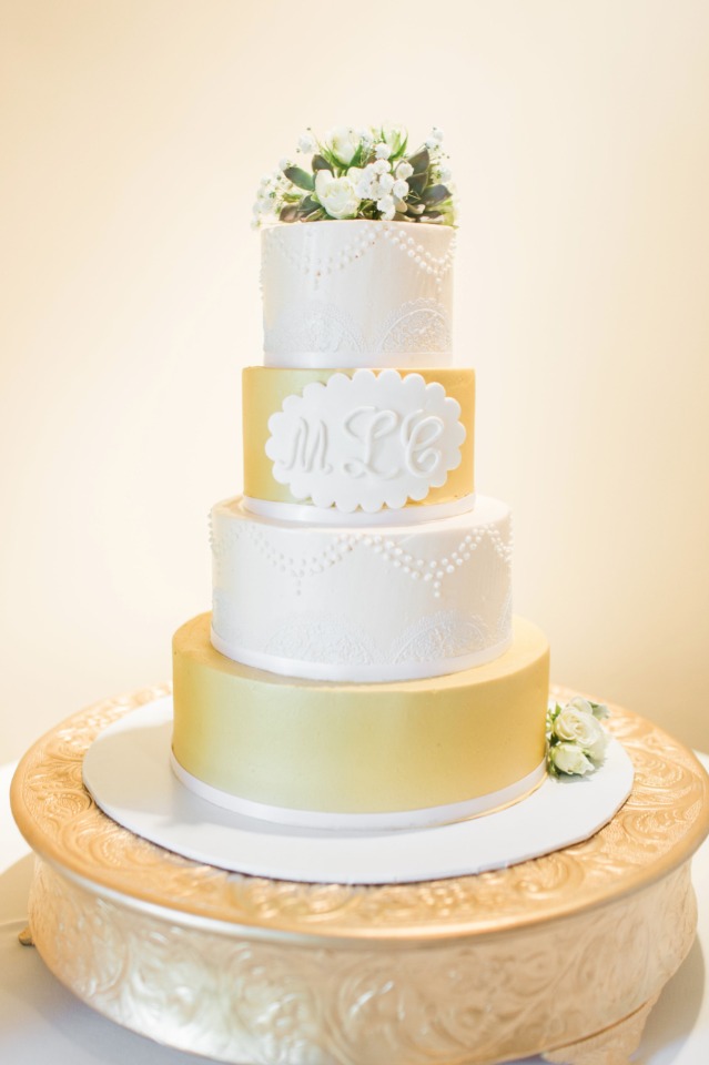 Gold and white wedding cake