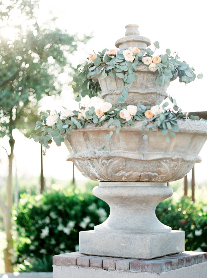 flower garland on wedding fountain