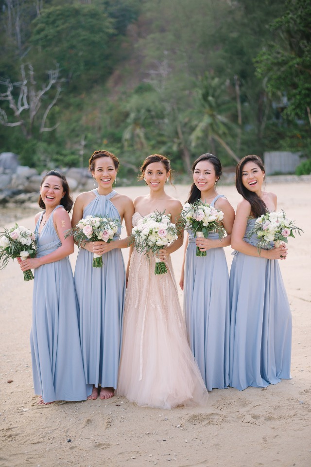 bridesmaids in periwinkle and bride in blush