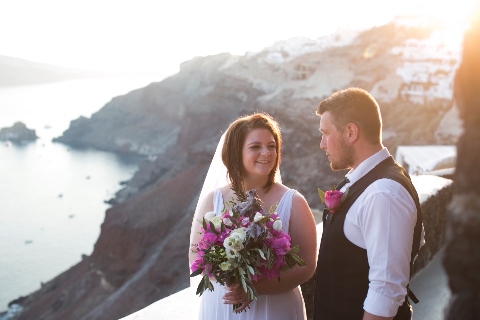 bride and groom at sunset in Greece