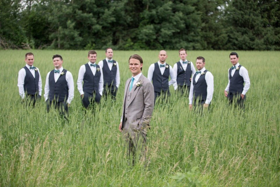 groom and his men in a field