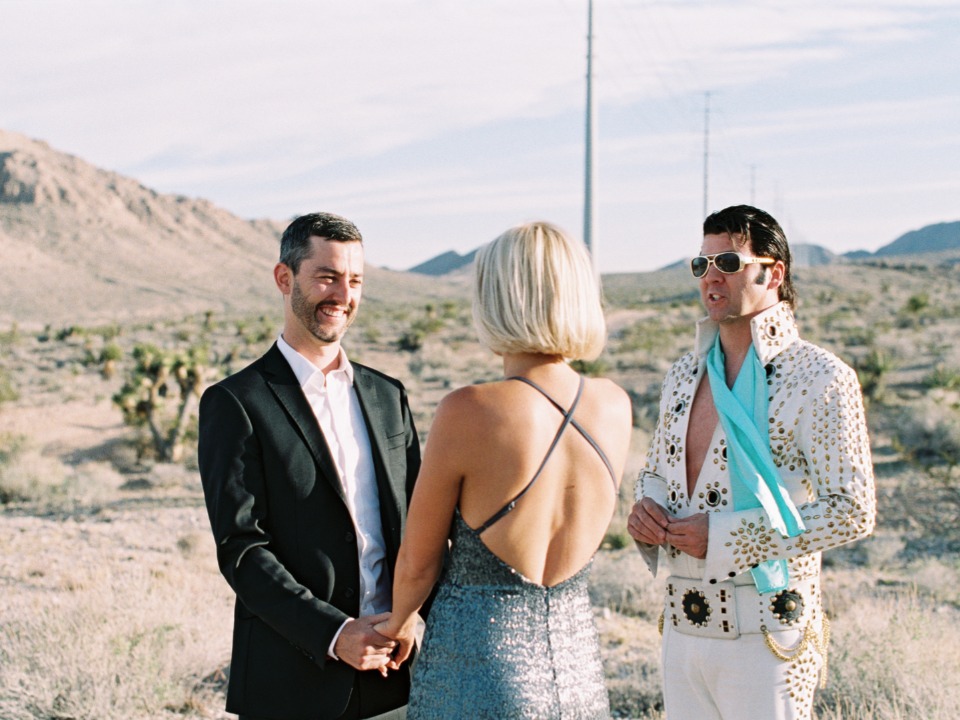 Wedding ceremony with Elvis impersonator in a desert setting