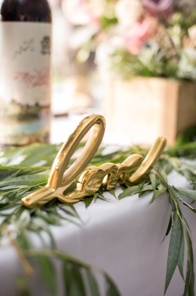 gold love sign, details and decor