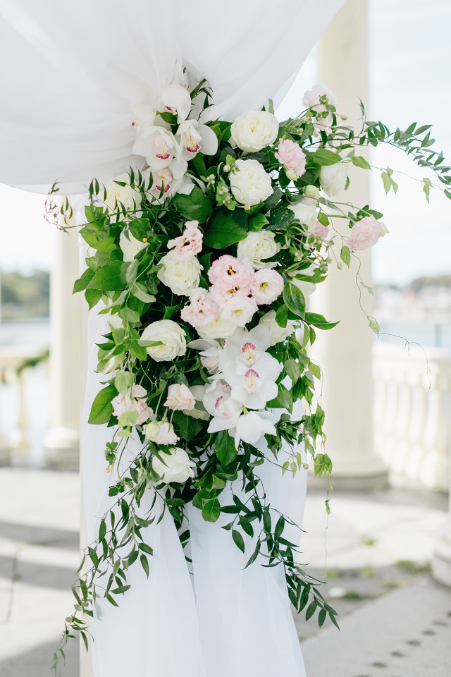 pink and white wedding ceremony floral decor