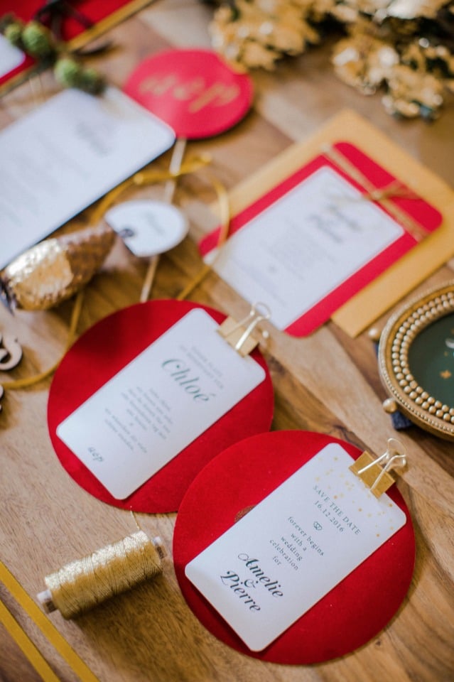 gold and red holiday themed wedding invitation suite