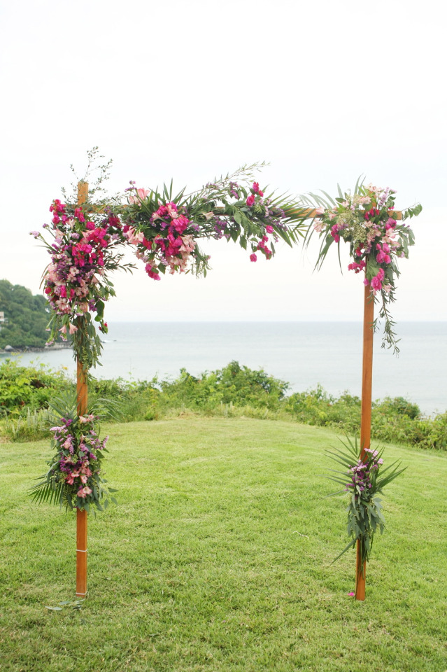 beautiful wedding arch with pink flowers