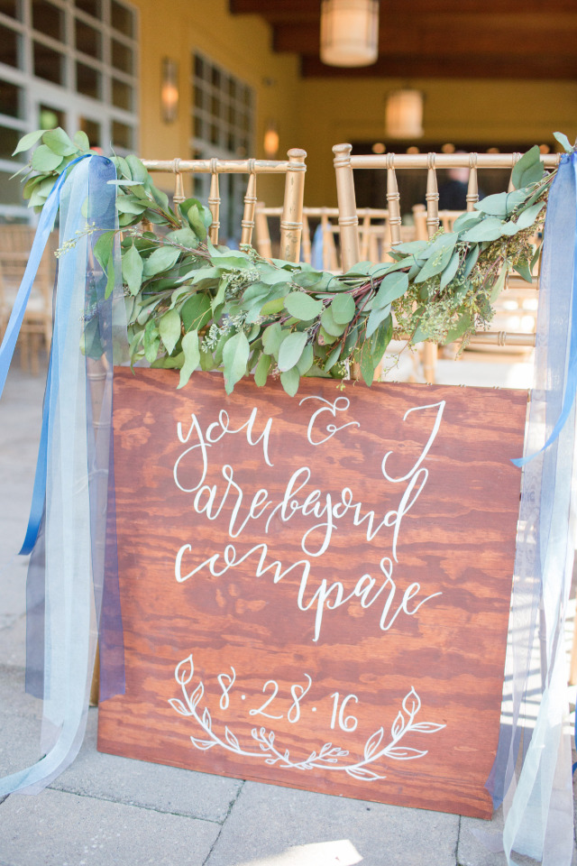 beyond compare wood wedding ceremony sign