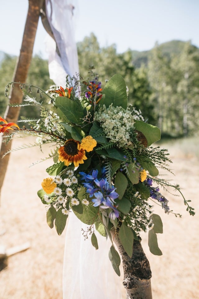 Ceremony arbor florals
