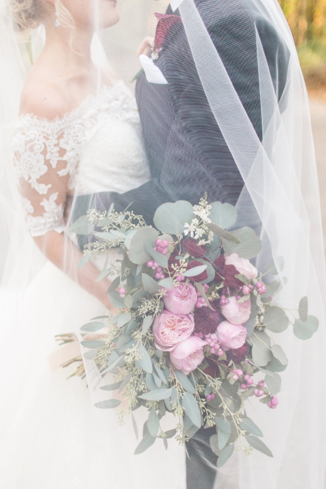 wedding veil bride and groom photo