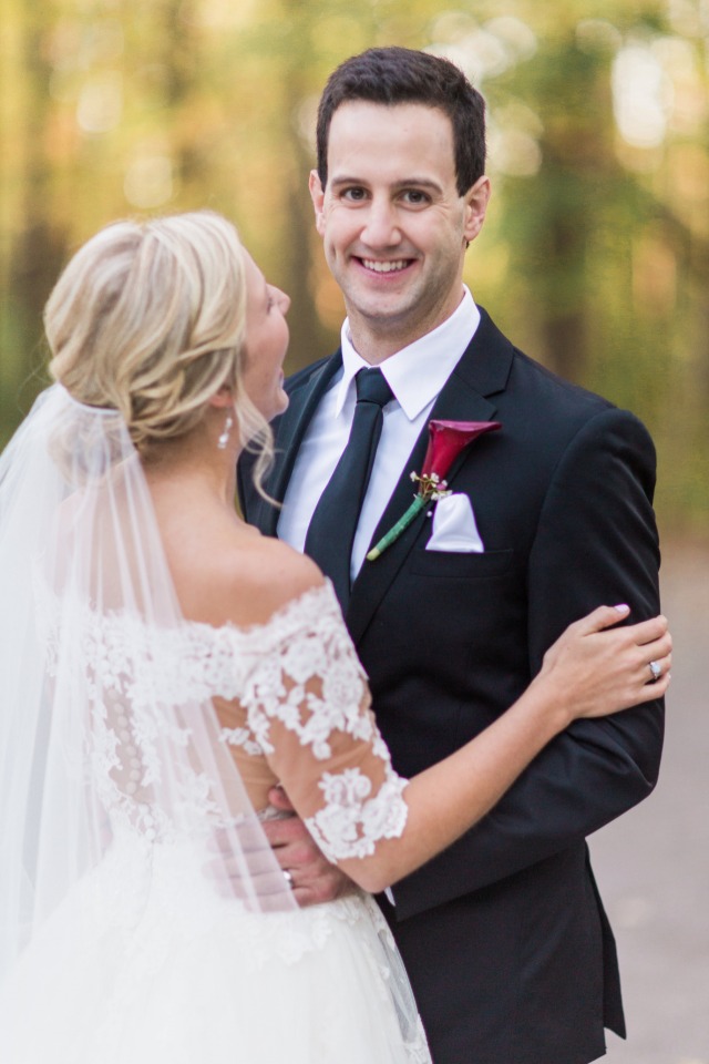 sweet smiling groom photo
