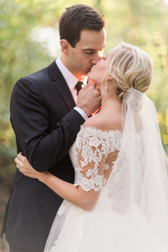 golden hour wedding kiss