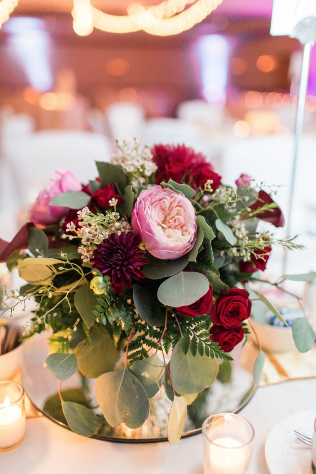 pink and deep red wedding flower arrangement