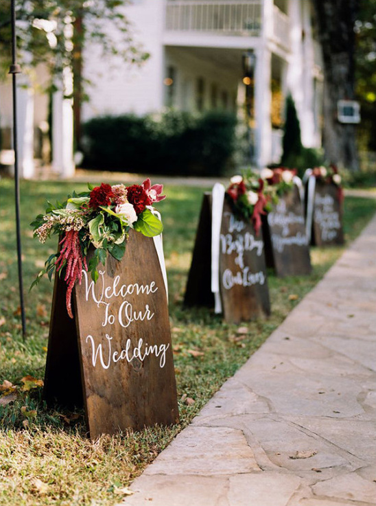Wedding welcome signs adorned with beautiful flowers