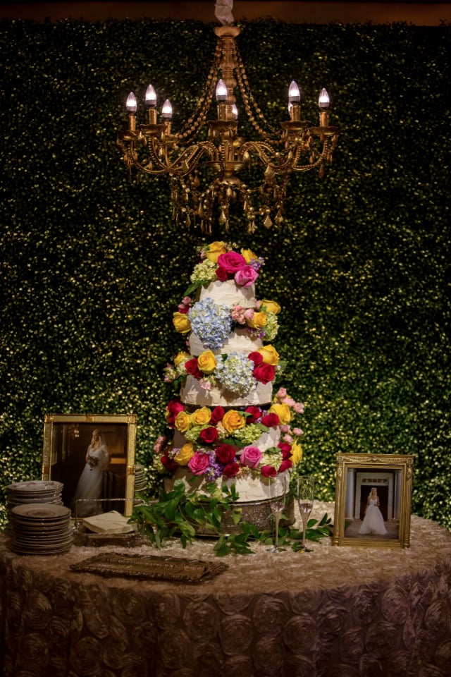 flower filled tiered wedding cake