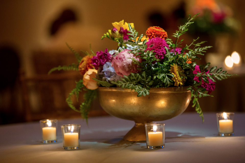 colorful flowers and gold wedding centerpiece