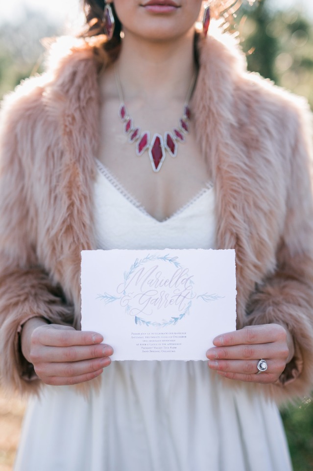 wedding invitation and warm fur coat