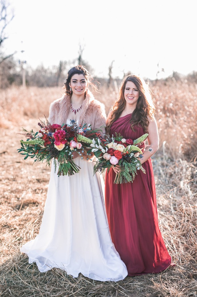 wintery bridal party in deep maroon and fur