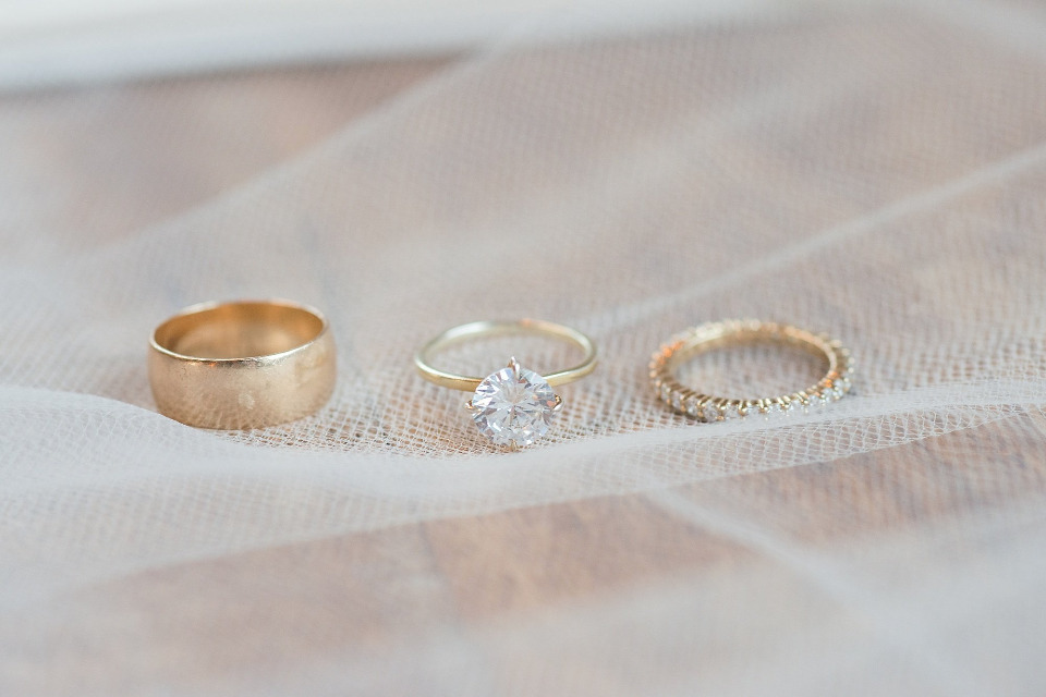 gold and diamond engagement ring and wedding bands