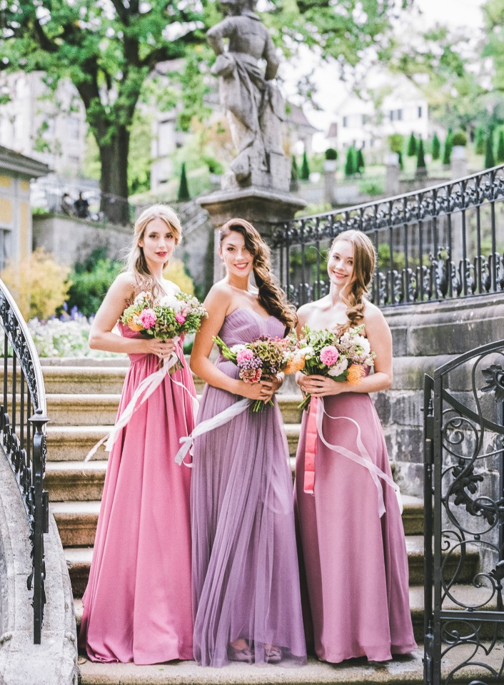 bridesmaids in pink and purple