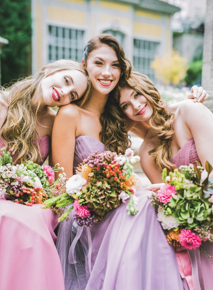 bridesmaids in pink and purple