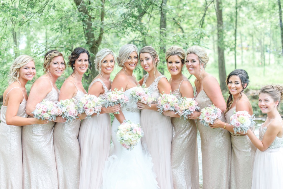 bridesmaids in shimmering sequin dresses in champagne