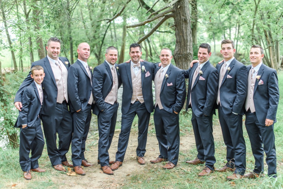 navy groomsmen suits with blush vests