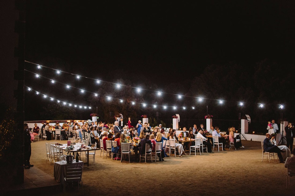 Outdoor reception with bistro lights