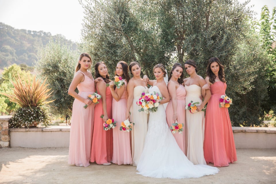 mixed peach and pink bridesmaid dresses