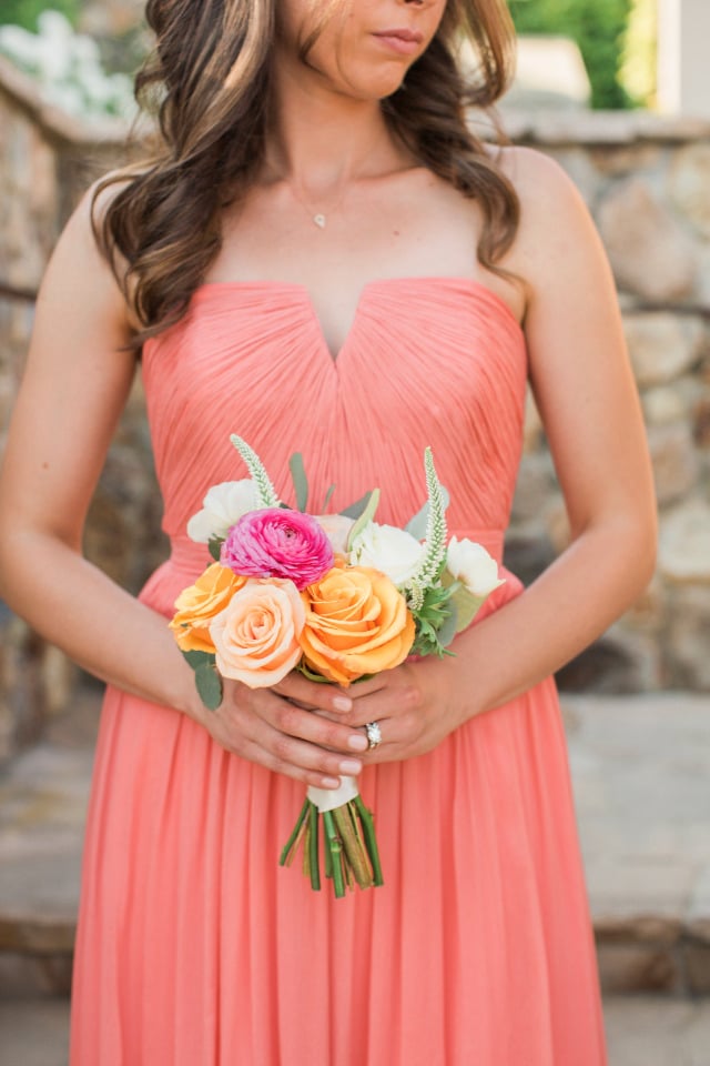 peach bridesmaids dress and bouquet
