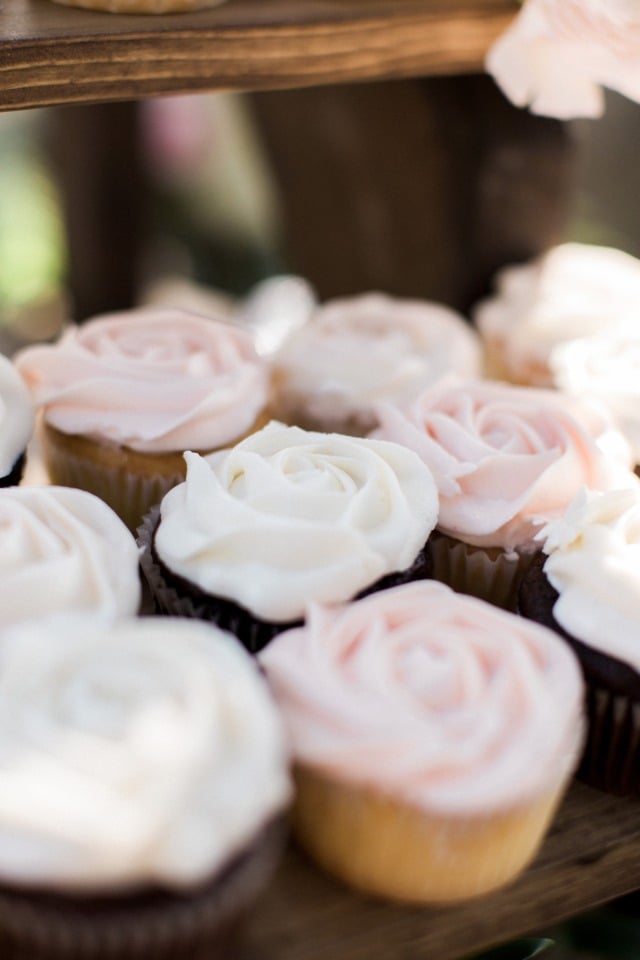 pink and white frosted wedding cupcakes