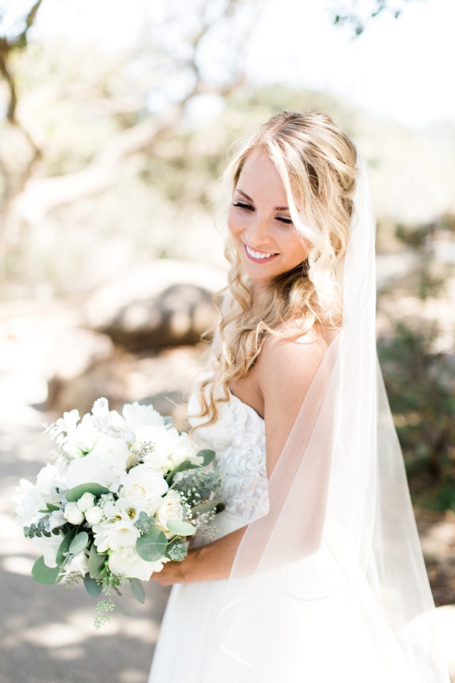carefree wedding waves half up hair and all white bouquet