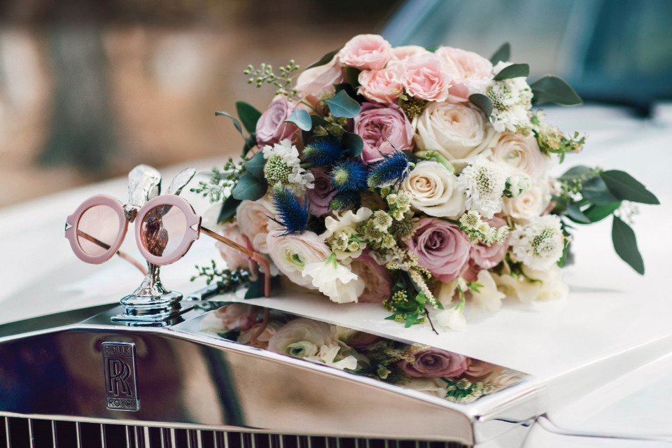rose colored galsses and bouquet