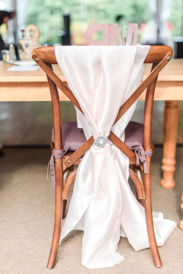 blush satin wedding chair draped