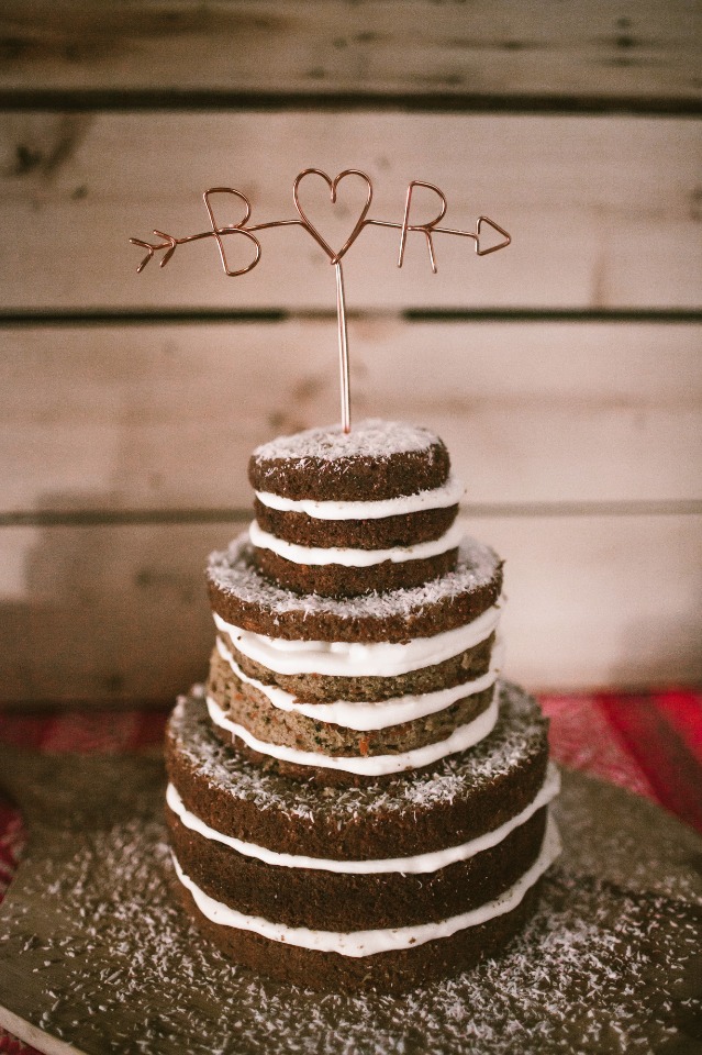 Naked wedding cake with metal initial topper
