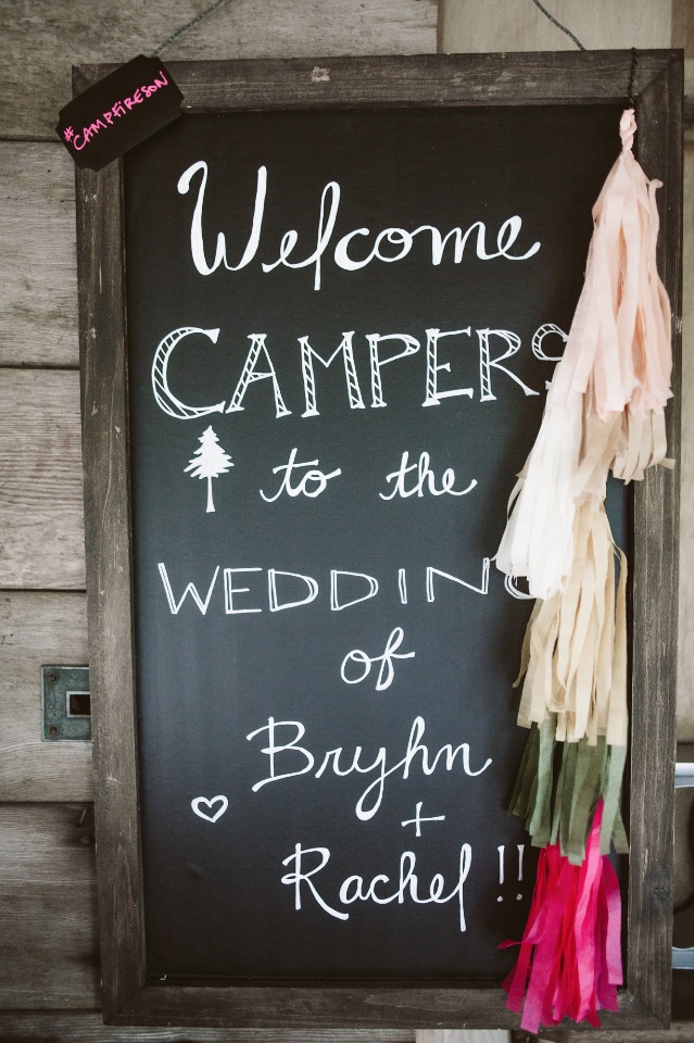 Welcome chalkboard sign with tassles