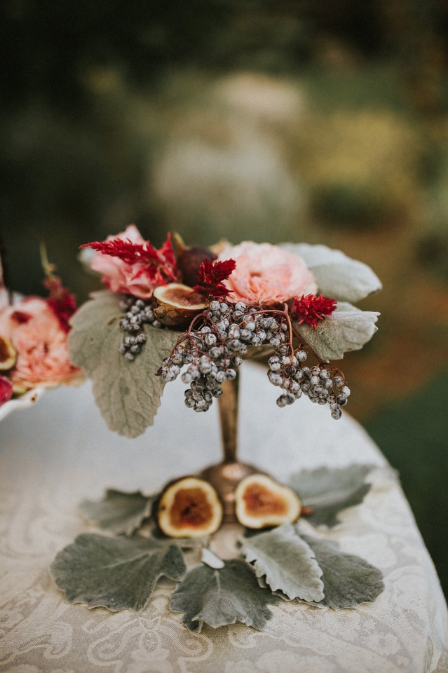 cake table decor with flowers and figs