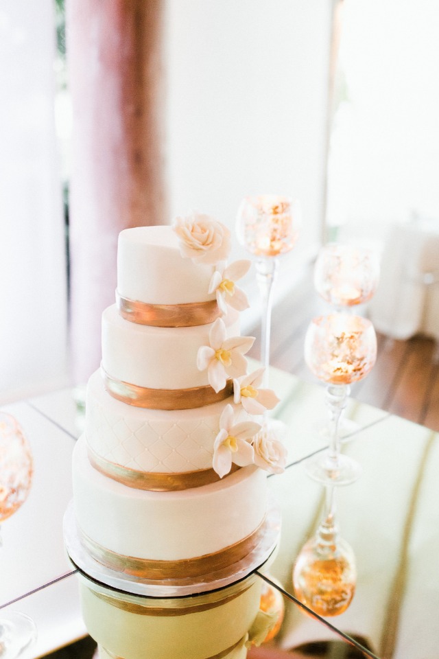 gold and white wedding cake