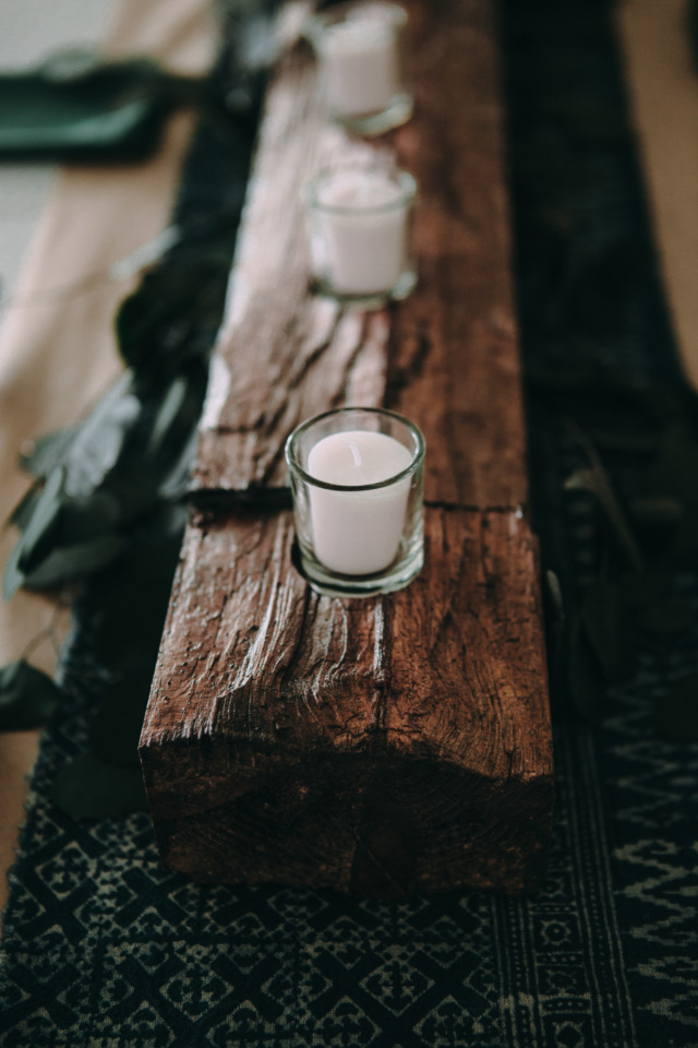 candle and wood wedding centerpiece