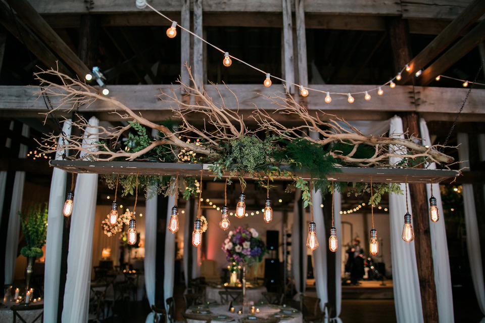 beautiful hanging floral and edison bulb decor