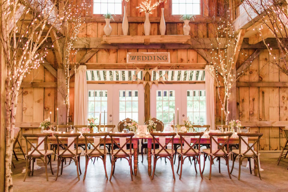 barn wedding reception with twinkle lights