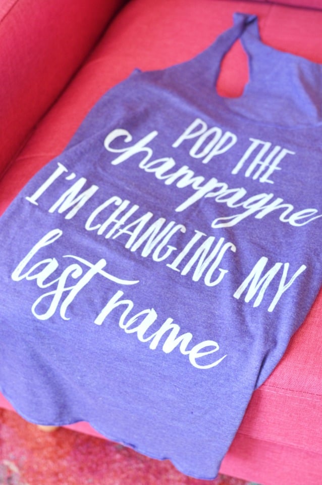 pop the champagne I'm changing my last name tank top