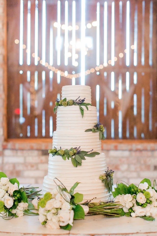 flower topped white wedding cake
