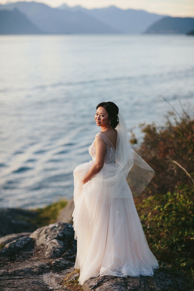 bride looking out over the water in Vancouver