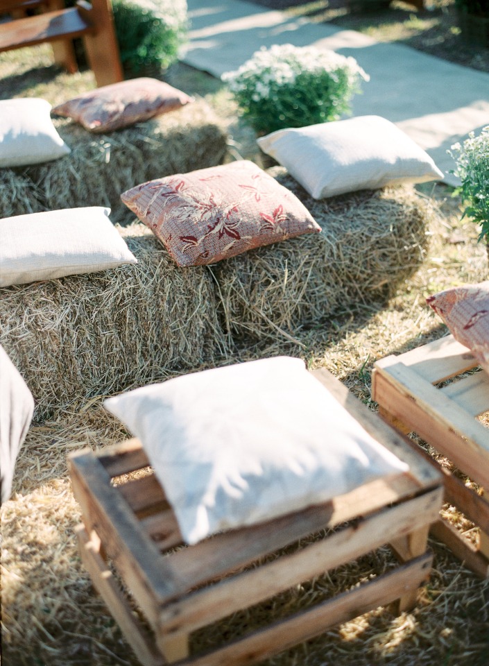 hay bale and pillow guest seating