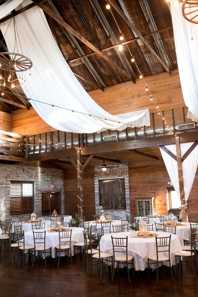 fabric draped wedding reception with twinkle lights
