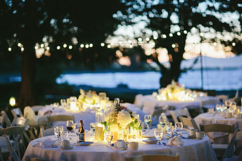 night time wedding reception with glowing centerpiece