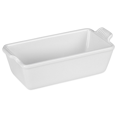 White rectangular ceramic loaf pan with handles for baking