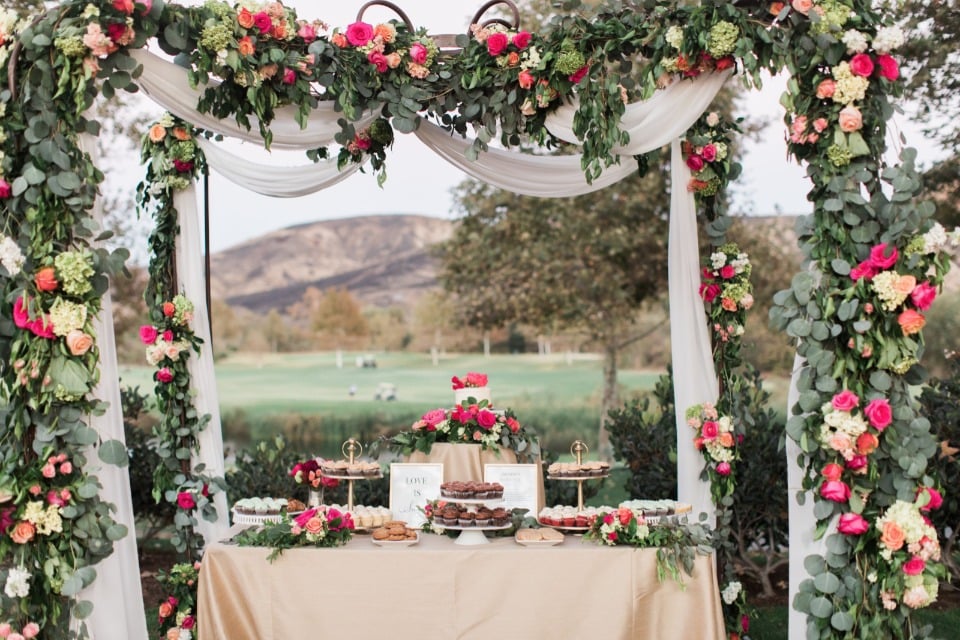 Reuse your ceremony arbor for your dessert table