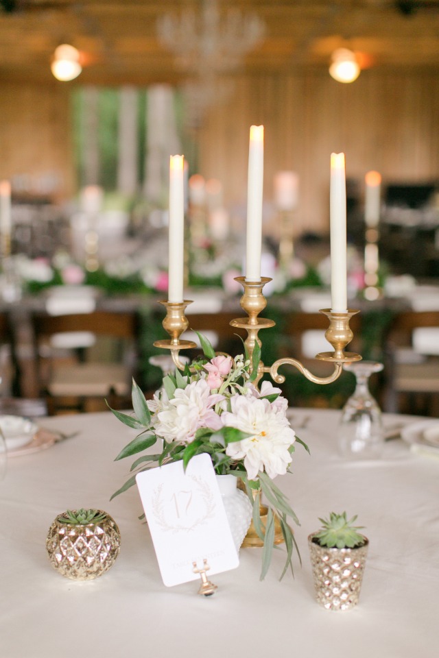 gold candelabras accented with fresh flowers